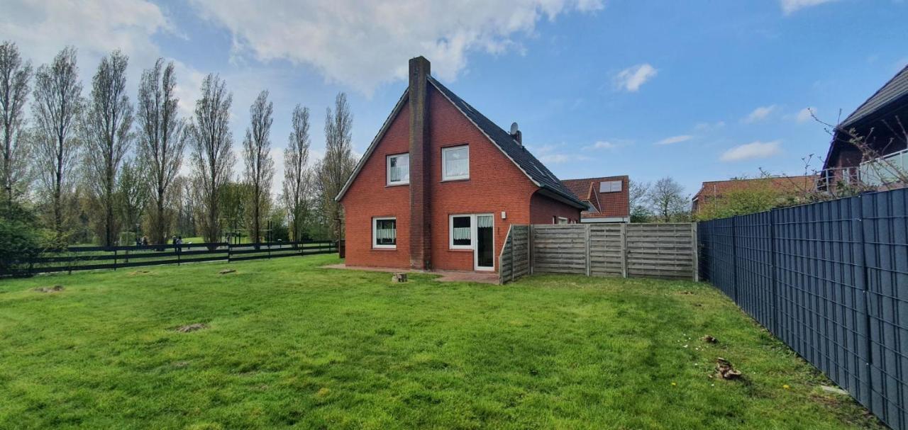 Ferienhaus Am Wellenpark Norddeich Экстерьер фото
